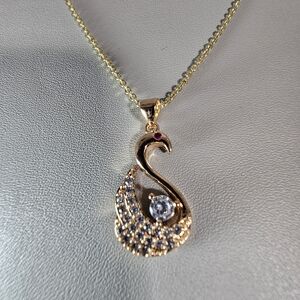 Elegant Gold and Silver Swan Pendant Necklace
